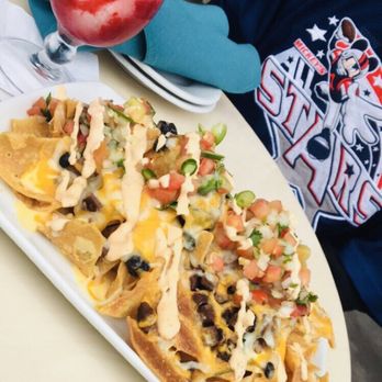 Lamplight Lounge - Steak Nachos and a Pina Colava (idk if they serve that drink anymore) | picture taken back when it was Cove Bar - New American Near Me - Anaheim, California Lamplight Lounge - Steak Nachos and a Pina Colava (idk if they serve that drink anymore) | picture taken back when it was Cove Bar - New American Near Me - Anaheim, California