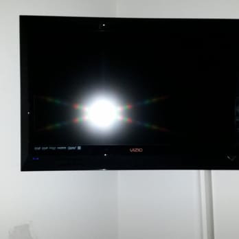 TvXpertz - Corner mounted TV in office - Home Theatre Installation Near Me