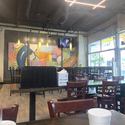 Noodle - Inside seating with anime on tv