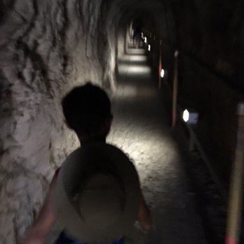 Diamond Head State Monument - The dark tunnel you go through.  Seems longer going up bc you do not see sunlight until you turn the corner at the end. - Parks Near Me - Honolulu, Hawaii