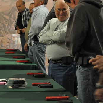 Top Shot Academy - Happy students at Top Shot Academy using SIRT Training Pistols and Blade-Tech Holsters. - Firearm Training Near Me - Hoffman Estates, Illinois