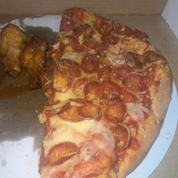 Pepperoni Pizza (after eating half) Pepperoni Pizza (after eating half)