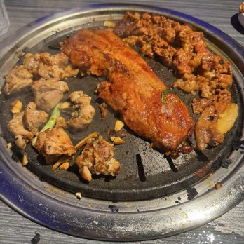 Gen Korean BBQ House - Variety of meats that we were cooking - Barbeque Near Me - Orlando, Florida