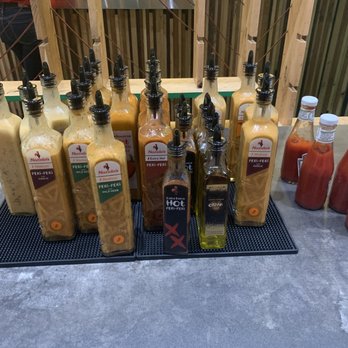 Nando's Peri-Peri - A wide array of sauces to try with your meal... - Chicken Shop Near Me - Chicago, Illinois Nando's Peri-Peri - A wide array of sauces to try with your meal... - Chicken Shop Near Me - Chicago, Illinois