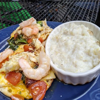 Werner's - This was the Seafood Benedict with grits. - Breakfast & Brunch Near Me - Baltimore, Maryland Werner's - This was the Seafood Benedict with grits. - Breakfast & Brunch Near Me - Baltimore, Maryland