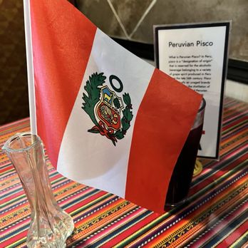 Lima Peruvian Cuisine - Peru's flag decor on table - Peruvian Near Me - Broken Arrow, Oklahoma Lima Peruvian Cuisine - Peru's flag decor on table - Peruvian Near Me - Broken Arrow, Oklahoma