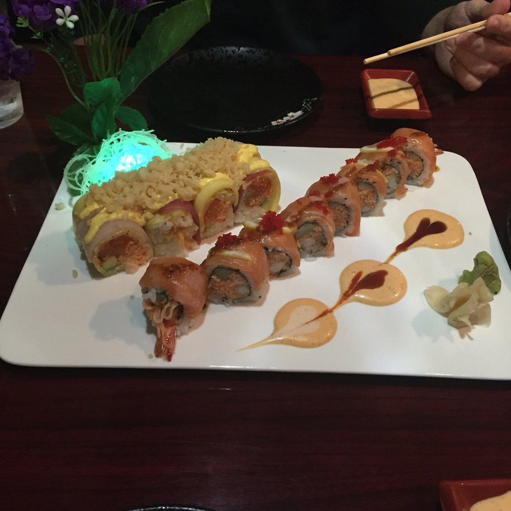 Hinode - OMG roll (left) and Oviedo sunrise (right) - Japanese Near Me - Oviedo, Florida