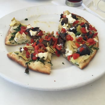 BrickTop's - Goat cheese on flatbread with artichokes, mushrooms and red peppers. - New American Near Me - Palm Beach, Florida