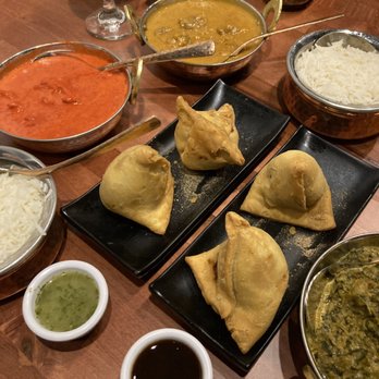 Karma Indian Cuisine & Lounge - Vegetable Samosas, L-R... Rice, Butter Chicken, ?, Palak Paneer - Indian Near Me - Spokane, Washington
