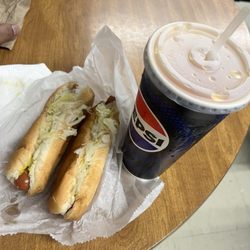 Boulevard Drinks - Two dogs mustard sauerkraut, orange drink(ate the chili dog earlier )