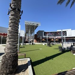 Hangar 28 - The round hang out zone with large tvs
