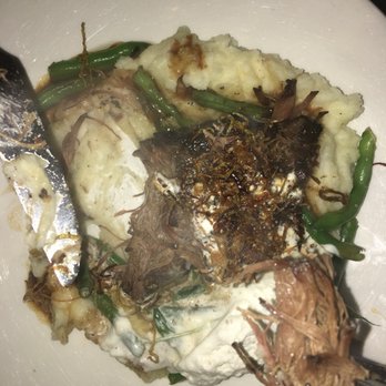Union Rooftop - Smoked Short Rib- a little messy after cutting into it but nonetheless delicious - New American Near Me - Minneapolis, Minnesota Union Rooftop - Smoked Short Rib- a little messy after cutting into it but nonetheless delicious - New American Near Me - Minneapolis, Minnesota