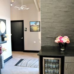 Essentials Dental - Beverage station upon entering with 2 public restrooms available.