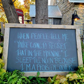 Cheshire Cat Pub - a chalkboard with a poem written on it - Pubs Near Me - Ottawa, Ontario