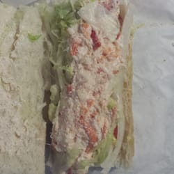 D'Angelo - Thin layer of squished seafood, mayo, and a few small pieces of lobster.