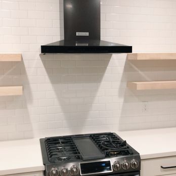 Ziebart Construction - black stainless steel range/hood set from samsung and kitchen aid. - General Contractors Near Me - Lake Oswego, Oregon Ziebart Construction - black stainless steel range/hood set from samsung and kitchen aid. - General Contractors Near Me - Lake Oswego, Oregon