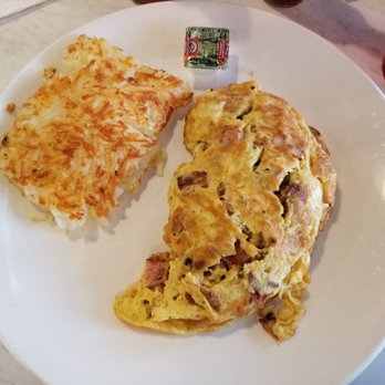 Eggsellent Cafe - Cowboy Omelette - Bacon, ham, and sausage with American cheese - Breakfast & Brunch Near Me - Frisco, Texas