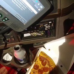 Flying J - One nice ice cold as the mountains blue silver bullet aluminum can and a slice of pizza. salut