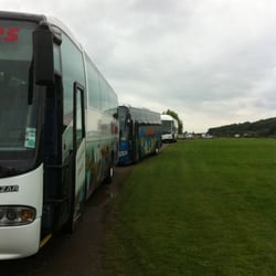 P C Coaches - A 49-seater, 55-seater, and 59-seater at Runnymede