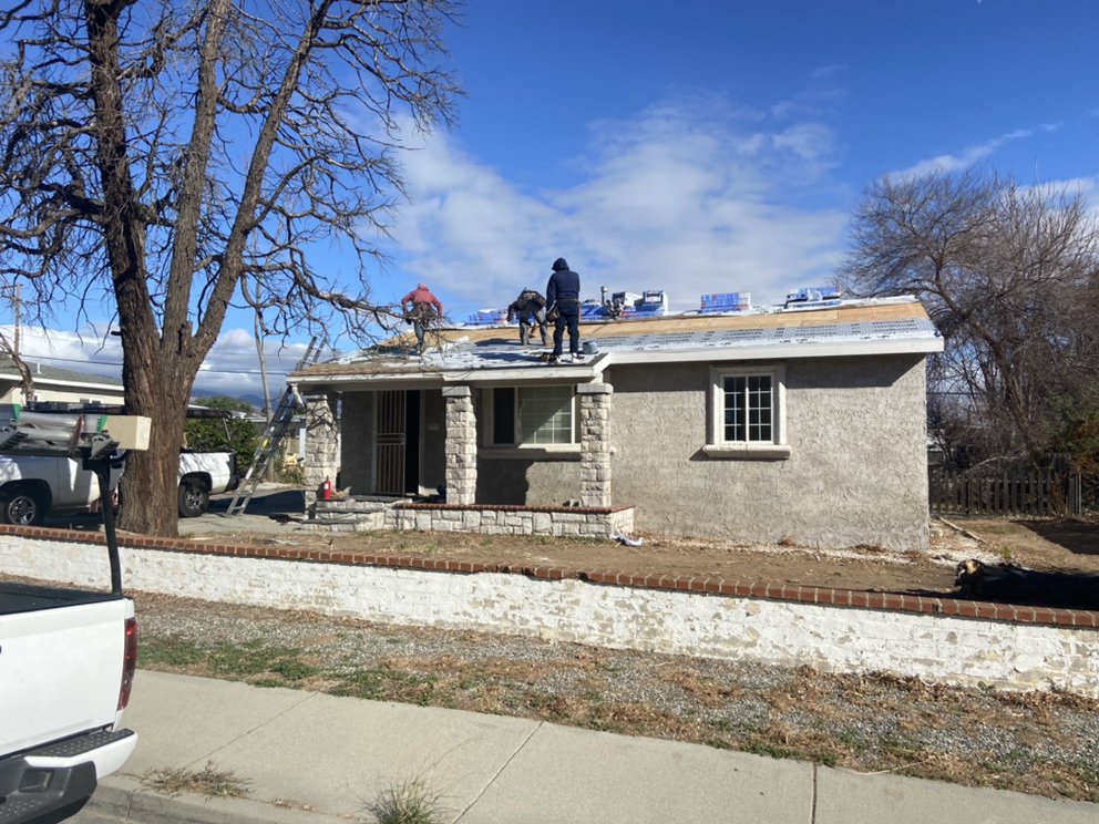 Slide of MRK Roofing Services