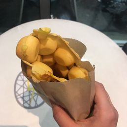 Cheese bubble waffle. Chewy inside, crunchy outside. Good stuff.