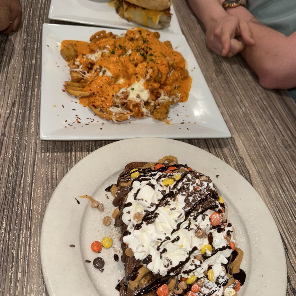 Nutella Reeses Churro French Toast, Spicy Vodka Chicken Parm Waffle Fries , some sort of insane burrito