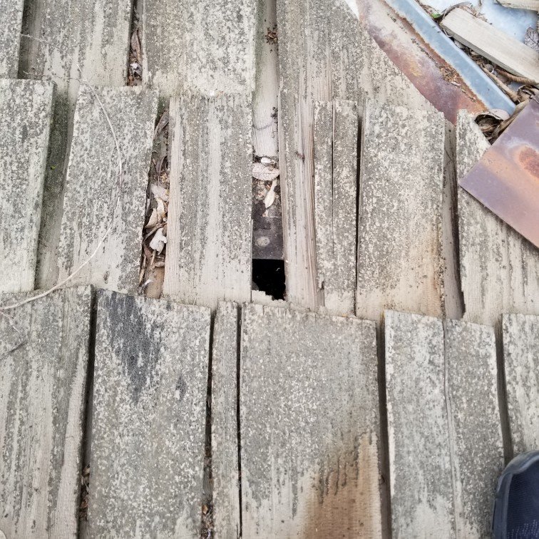 Slide of Roof Pros Roofing