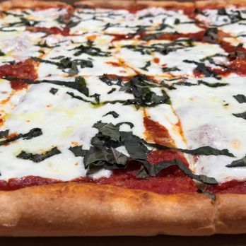 Angela's Pizza Kitchen - a pizza with spinach and mozzarella - Pizza Near Me - Boca Raton, Florida Angela's Pizza Kitchen - a pizza with spinach and mozzarella - Pizza Near Me - Boca Raton, Florida