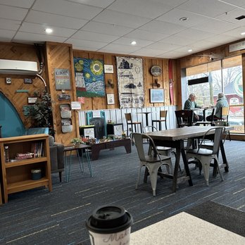 Brewed Awakening - a coffee cup on a table in a coffee shop - Cafes Near Me - Vermilion, Ohio Brewed Awakening - a coffee cup on a table in a coffee shop - Cafes Near Me - Vermilion, Ohio