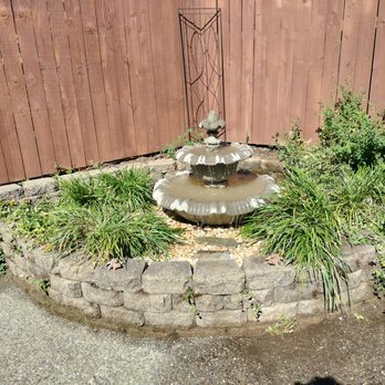 Serenity Scapes - a fountain in a garden - Landscaping Near Me Serenity Scapes - a fountain in a garden - Landscaping Near Me