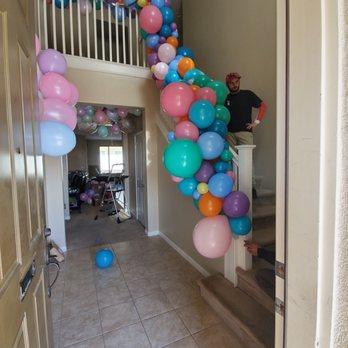 Sunny Balloons - Stairwell garland - Balloon Services Near Me Sunny Balloons - Stairwell garland - Balloon Services Near Me
