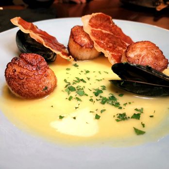 Mandrake - Scallops with clams and Serrano ham - Tapas/Small Plates Near Me - Geneva, Illinois Mandrake - Scallops with clams and Serrano ham - Tapas/Small Plates Near Me - Geneva, Illinois