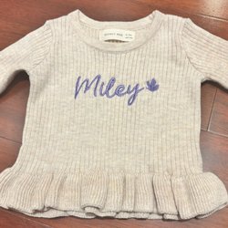 MRD Custom Grafix - Embroidery on a newborn outfit