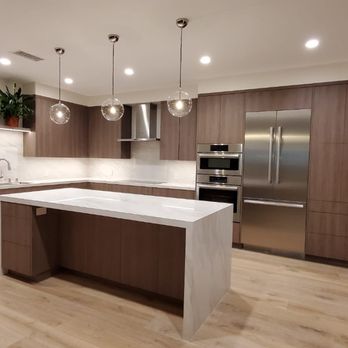 Trustwork Construction - a modern kitchen with stainless steel appliances - General Contractors Near Me