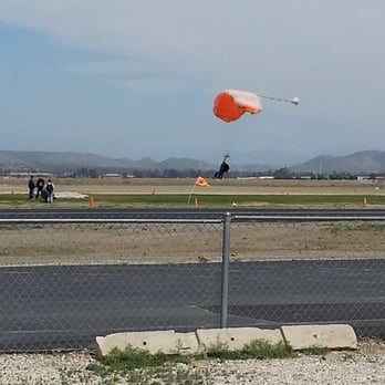 Skydive Perris - My other friend almost on the ground. - Skydiving Near Me - Perris, California Skydive Perris - My other friend almost on the ground. - Skydiving Near Me - Perris, California