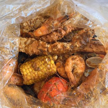 Big Hot Crab - a large pile of food wrapped in plastic - Seafood Near Me - Chico, California Big Hot Crab - a large pile of food wrapped in plastic - Seafood Near Me - Chico, California