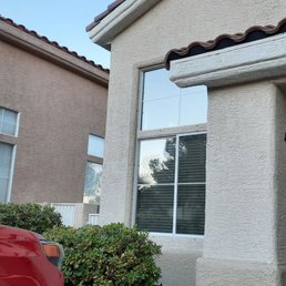 My newly tinted windows in comparison to my neighbor's