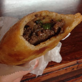Charlotte Bakery - Venezuela empanada. Ground beef, onions cilantro. A bit sweet with crispy outer batter. Delicious! - Bakeries Near Me - Miami Beach, Florida Charlotte Bakery - Venezuela empanada. Ground beef, onions cilantro. A bit sweet with crispy outer batter. Delicious! - Bakeries Near Me - Miami Beach, Florida