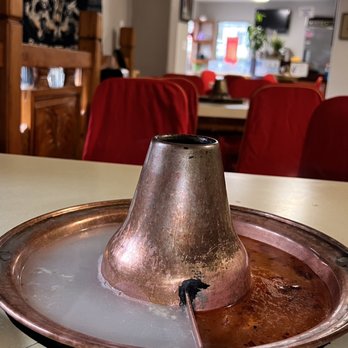 Beijing Hot Pot - a hot pot sitting on a table - Chinese Near Me - Portland, Oregon Beijing Hot Pot - a hot pot sitting on a table - Chinese Near Me - Portland, Oregon