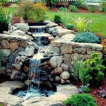 Twin Pines Landscaping - a waterfall in a garden - Landscaping Near Me - Southborough, Massachusetts Twin Pines Landscaping - a waterfall in a garden - Landscaping Near Me - Southborough, Massachusetts