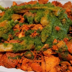 Hajrah Halal Food - Chicken over rice in green sauce