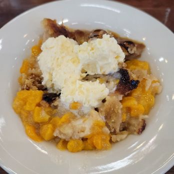 Pucketts - BNA Terminal D - Cobbler of the day. Peach.. - Barbeque Near Me - Nashville, Tennessee Pucketts - BNA Terminal D - Cobbler of the day. Peach.. - Barbeque Near Me - Nashville, Tennessee