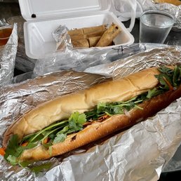 a large sub sandwich on aluminum foil a large sub sandwich on aluminum foil