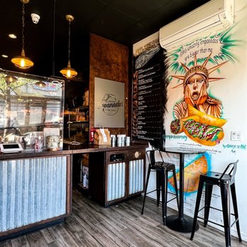Empanadas Mix - a restaurant with a mural on the wall - Venezuelan Near Me - Jackson Heights, New York Empanadas Mix - a restaurant with a mural on the wall - Venezuelan Near Me - Jackson Heights, New York