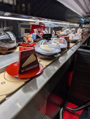 Kura Revolving Sushi Bar by null