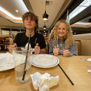 IHOP - two people sitting at a table with empty plates - American Near Me - Richmond, California