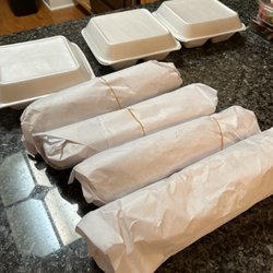 Westwego Seafood - Four 12" poboys and three large orders of fries. That's how big the poboys are!