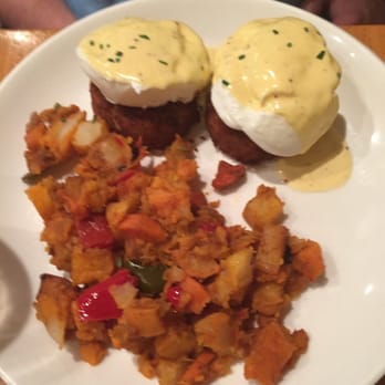 Sweet Grass Grill - Close up of the crab cakes Benedict - New American Near Me - Tarrytown, New York Sweet Grass Grill - Close up of the crab cakes Benedict - New American Near Me - Tarrytown, New York