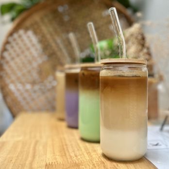 Kafei - a variety of drinks on a table - Coffee & Tea Near Me Kafei - a variety of drinks on a table - Coffee & Tea Near Me