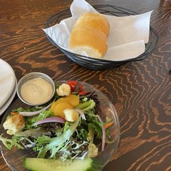 Sagebrush Grill - House salad with house-made ranch dressing along with dinner rolls.